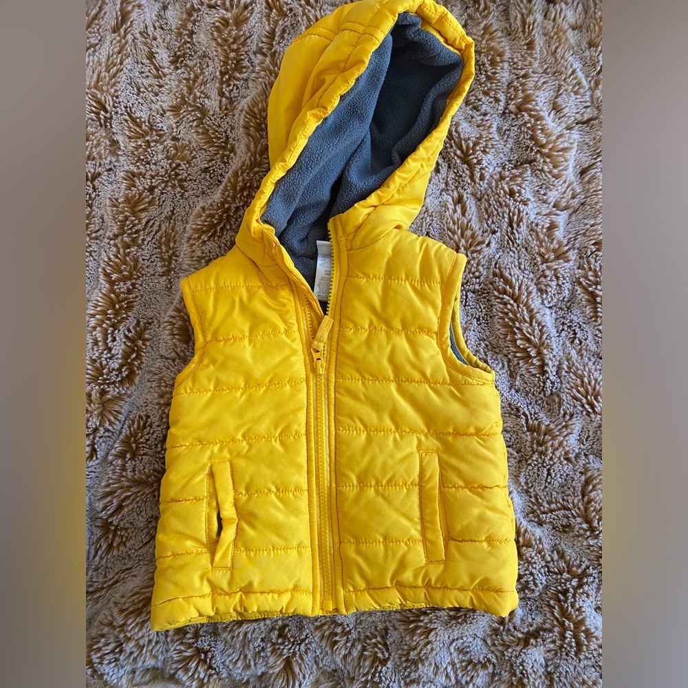 Fleece lined yellow Little Me puffer vest in 18 months